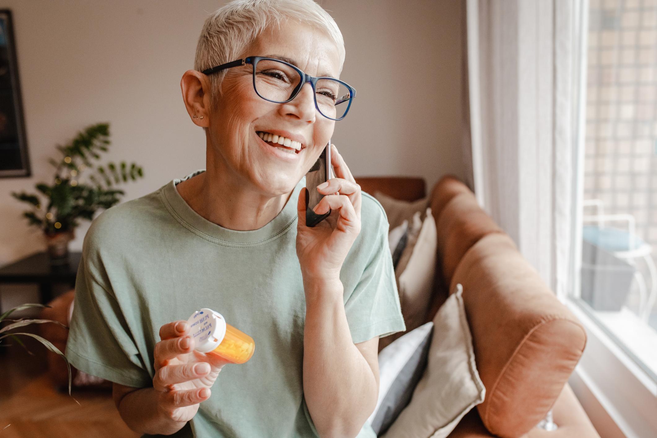 Woman talking on cell phone and smiling